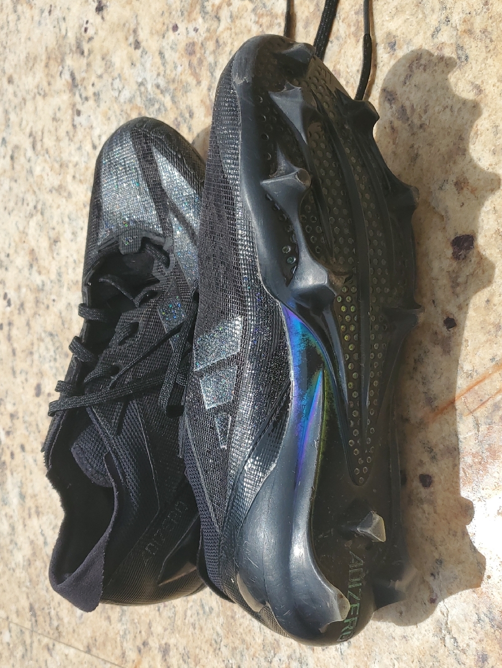 Black Adidas Adizero Football Cleats with Iridescent Accents